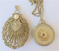 Two vintage gilt metal fob watch pendants