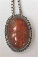 Vintage carved amber floral brooch/pendant