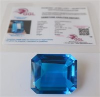 Large Emerald cut Blue Topaz weighs 104.20 carats