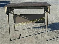 Antique Wooden desk with metal legs.