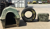 Doghouse with light, Goodyear Tire and Army cooler