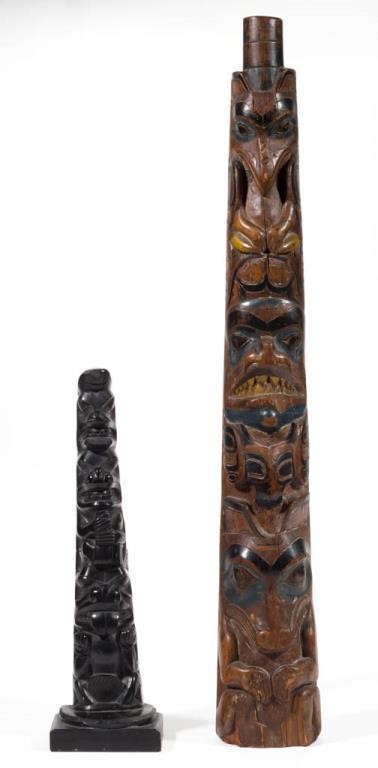 Northwest Coast Native American carved model totem poles, one argillite, the other paint-decorated wood, each early 20th century