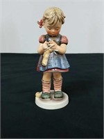 A stitch in time Hummel figurine