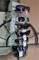 Lot - New woman's Fashion sunglasses with rack.