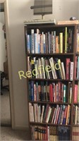 Bookshelf with books and more