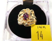 14K Yellow gold oval cut garnet ring with diamond