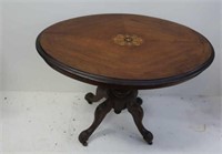 Antique small oval inlaid walnut table
