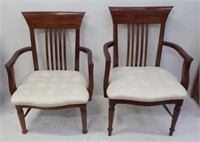 Pair cream upholstered rail back chairs