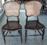 Pair antique English oak and rattan chairs