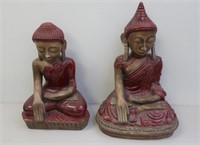Two 20thC red glazed ceramic Buddhas