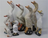 Eight vintage white painted wooden ducks