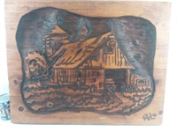 Relief en bois sculpté et pyro-gravé, signé Pelo
