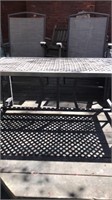 Metal out door patio table with two folding chairs