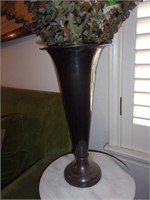 Tall metal vase