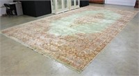 A Persian Style Green, Beige and Blue Carpet 22' L