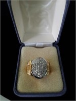 10K Gold and diamond ring.