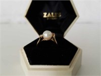 14K Gold pearl and diamond ring.