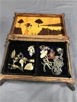 Assorted items in jewelry box (Haiti--11 by 8)