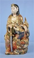 Seated Japanese Kutani Kannon with Shishi