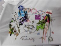 Large assortment of multi-colored costume jewelry
