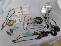 Large assortment of turquoise, brown, and gold