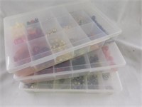 3 plastic boxes of colorful beads