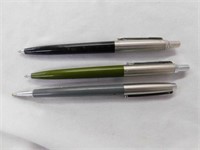 Three Parker ball point pens, black - gray -