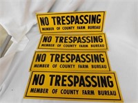 Four "No Trespassing" County Farm Bureau signs
