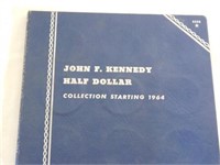Kennedy half dollar book with 8 half dollars