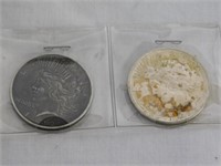 Two 1922 D&P Peace silver dollars