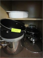 Contents of Lower Cabinets in Kitchen: Pots/Pans,