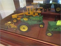 Four Diecast Toys Including John Deere Tractors