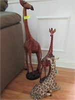 Three Giraffes: Two Standing are Wood,