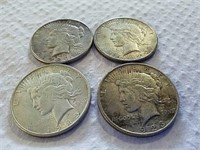 4 peace silver dollars