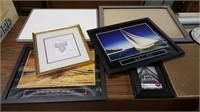 assorted lot of pictures and frames and whiteboard