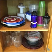 Cupboard of Plastic Bowls, Plates, Pitchers