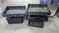 Black plastic storage trays