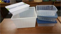 Assorted plastic storage totes and tubs