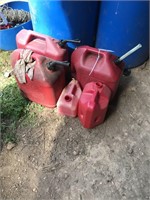 5 empty gas cans