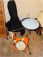 Music items: Vic Firth drum pad w/drumsticks,