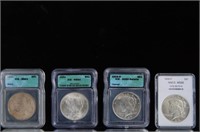 Collection of four Peace Dollars