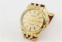 1960s 14K Gold Rolex Oyster Perpetual Watch. Linen