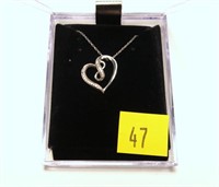 Sterling silver and diamond heart shaped necklace