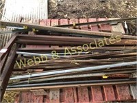 pallet full of metal posts and stakes