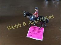 Miniature cast iron horse with queen rider