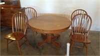 Oak pedistal table w/4 chairs