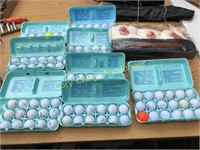 Collection of golf balls and golf club covers