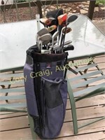 Assortment of golf clubs with bags, ping bag