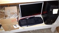 Asus computer with monitor keyboard and
