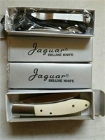 4 folding knives, all NEW.